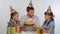 Dad shows children a birthday cake with candles