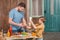 Dad and son cooking meat burgers together