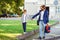 Dad and son holding hands outdoors. Family, fatherhood and relationship. Back to school