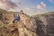 Dad and son tourists on the background of beautiful rocks and the sea. Hiking concept. Tobizin cape. Vladivostok, island