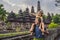 Dad and son tourists in Traditional balinese hindu Temple Taman