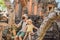 Dad and son travelers in the background of Pura Taman Kemuda Saraswati Temple in Ubud, Bali island, Indonesia BANNER