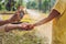 Dad and son use mosquito spray.Spraying insect repellent on skin outdoor