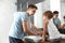 Dad and son washing razors