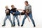 Dad and sons stretch sister by the arms and legs, white background