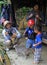 Daddy, mom and two sons are walking in tourist