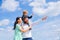 Daddy, mommy and child son. Happy family - child son playing with paper airplane. Portrait of happy father giving son