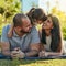 Daddys girl, mommys world. an adorable little girl and her parents spending quality time together in the park.