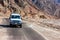 DAHAB, EGYPT - AUGUST 26, 2010: Tourists in jeep in desert near Dahab, Egypt.