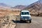 DAHAB, EGYPT - AUGUST 26, 2010: Tourists in jeep in desert near Dahab, Egypt.