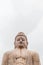 Daibutsu, The Great Buddha Statue in meditation pose or Dhyana Mudra seated on a lotus in open air near Mahabodhi Temple.