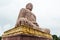 Daibutsu, The Great Buddha Statue in meditation pose or Dhyana Mudra seated on a lotus in open air near Mahabodhi Temple.