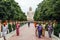 Daibutsu, The Great Buddha Statue in meditation pose or Dhyana Mudra seated on a lotus in open air with trees and Indian people.