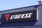 Dainese logo brand and text sign on store facade protective gear and clothing for