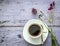 Daisies and clover, black coffee, copyspace, topview