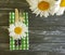 Daisy flower fork knife wooden background summer dinner