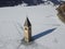 Dal drone Il campanile sommerso del lago di Resia con la neve