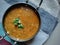 Dal fry or traditional Dal Tadka Curry served in a bowl, Indian popular food.