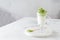 Dalgona Matcha Latte, a creamy whipped matcha, on light background. Matcha green tea. Side view, copy space. Vegan menu, matcha