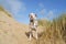 Dalmatian having fun on the beach