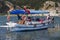 The Dalyan River with tourist boats in the straits of the river catching blue crab.