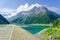 Dam and azure mountain lake in Alps, Austria