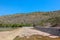 The dam crest the concrete spillway. countryside blocks the river to store water for agriculture