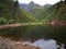 A dam on a farm on a rainy day surrounded by forests in Robertson, South Africa