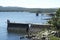dam that forms a reservoir in a mountainous context. Dinghies sailing on the lake. Embalse de Rio Tercero, CÃ³rdoba,