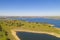 Dam lake reservoir drone aerial view of Barragem do Caia Dam olive trees landscape in Alentejo, Portugal