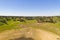 Dam lake reservoir drone aerial view of Barragem do Caia Dam olive trees landscape in Alentejo, Portugal