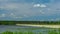 Dam on the lake reservoir nature bird water period of time clouds sky landscape trees