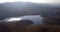 Dam, landscape and drone on lake in the mountain with sun or light on river, water or nature. Calm, environment and