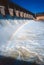 Dam spillway with rainbow