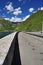 Dam walkway. Alpine lake (lago) Morasco, Formazza valley, Italy