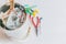 Damage the electric kettle with blurred the electric wire cable, multicolor of tweezers, plier, screwdriver, part, mechanic tool,