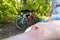 Damage to the legs during outdoor activities in the summer, cycling. An open bleeding wound on the knee with cleansed skin,