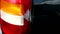 Damage to the taillight of the car, accident. Car insurance, background, close-up, deformation