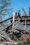 A damaged barn is a pile of wood, after strong storms