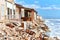 Damaged beach houses. Spain