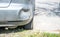 Damaged car with deformation on the rear bumper broken in the traffic road accident and collision while dangerous driving and brak