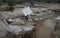 Damaged cars and debris after floodings in San Llorenc in the island Mallorca vertical