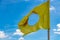 The damaged dhammacakka flag, the symbol of Buddhism