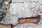 Damaged dirty old brick wall is close