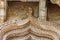 Damaged entrance bow at Lotus Mahal, Zanana Enclosure, Hampi, Karnataka, India