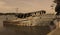 A damaged fisherman boat on a indian small harbor.