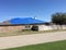 Damaged house by tornado in community