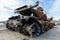 damaged military tank on a city street in Ukraine