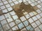 Damaged tiled floor