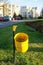 Damaged trash bin in the cit